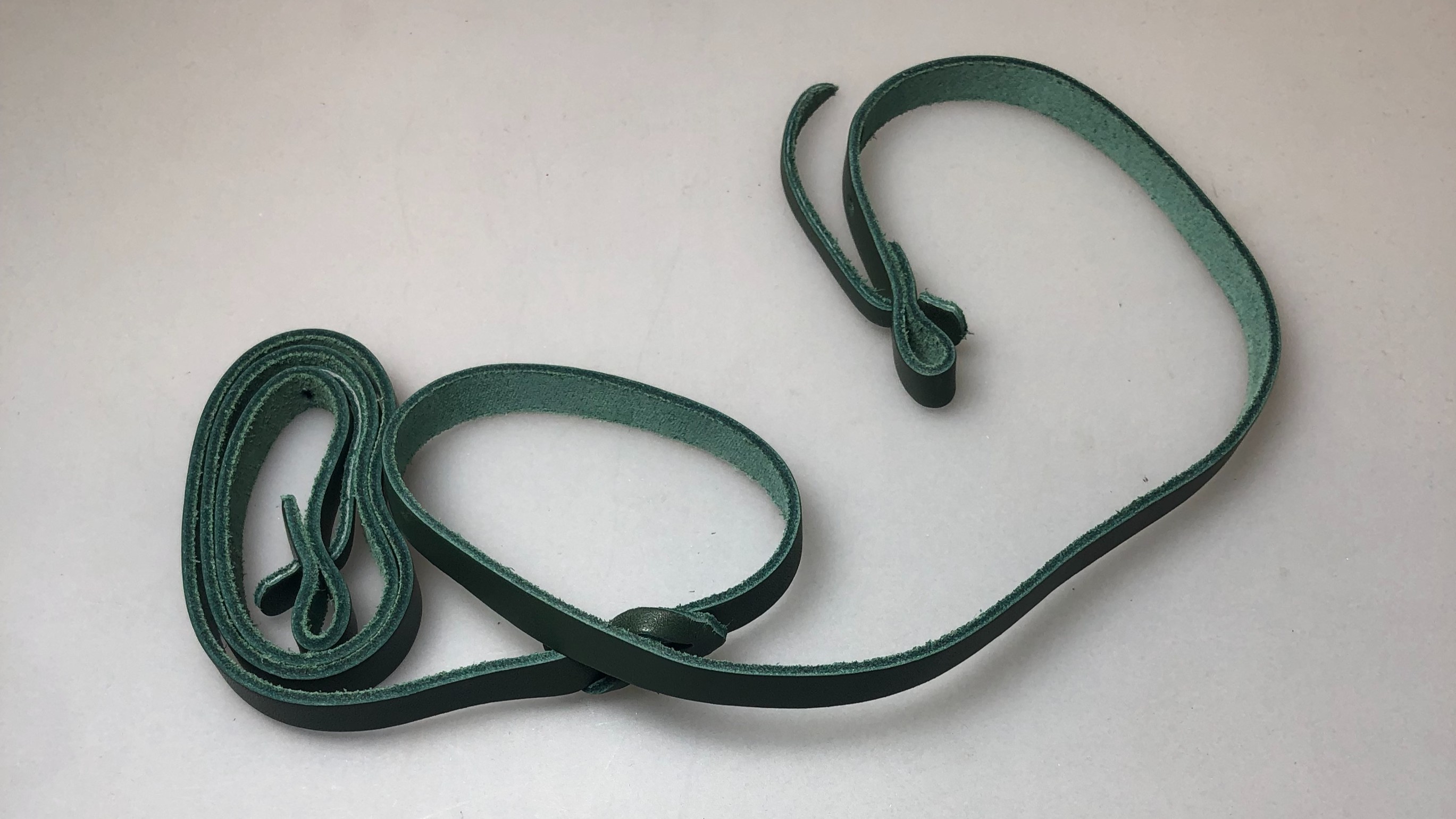 Elless Ledertragriemen grün